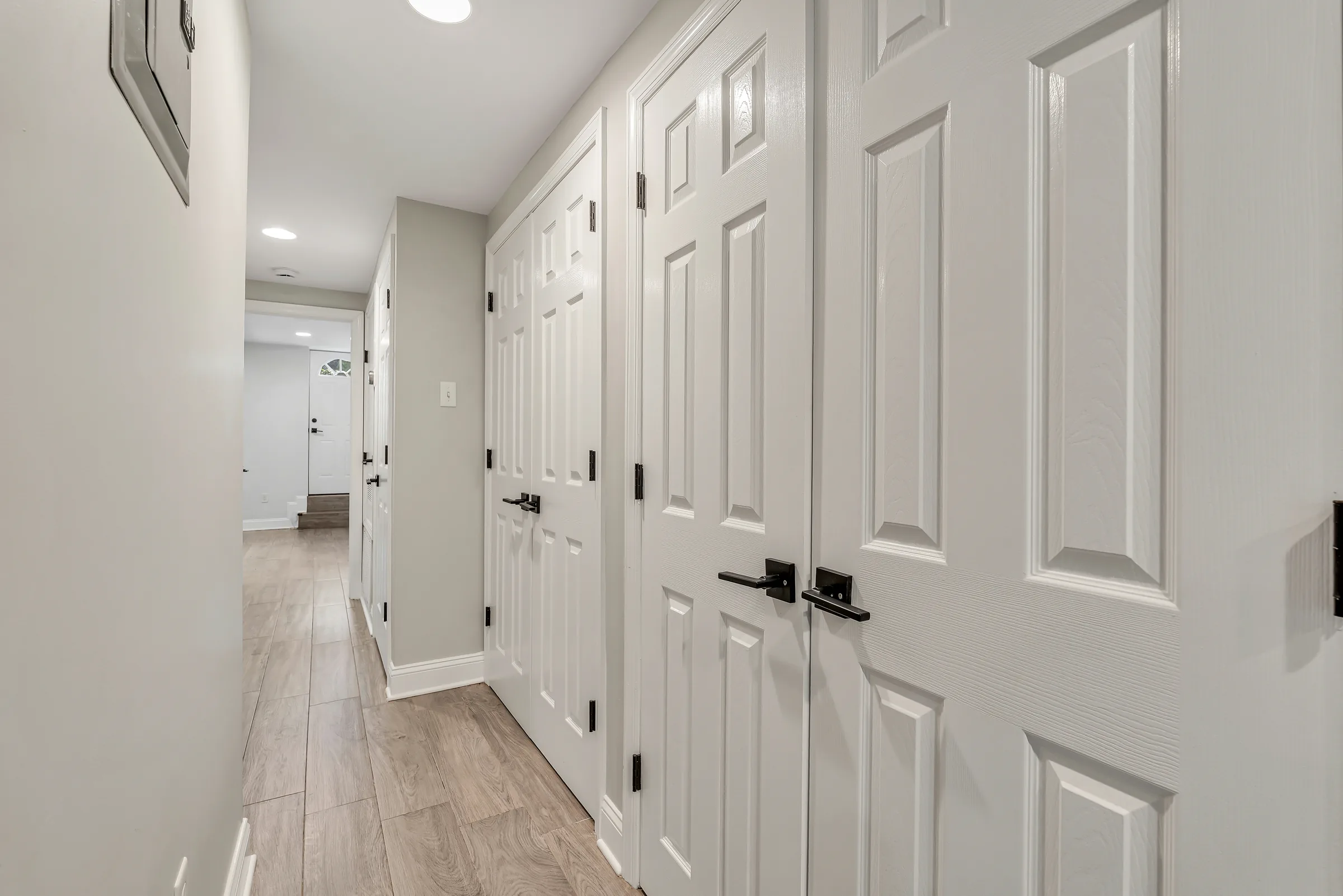 Hallway with white doors at the garden apartment, 829 Garden Street.