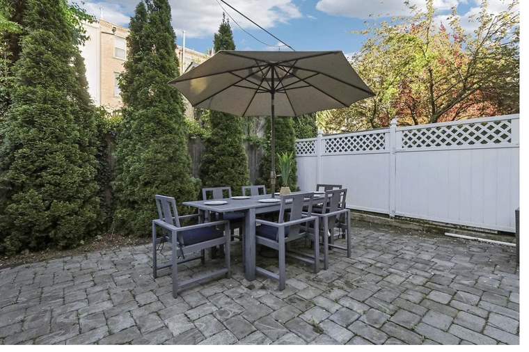 Screened patio surrounded by trees