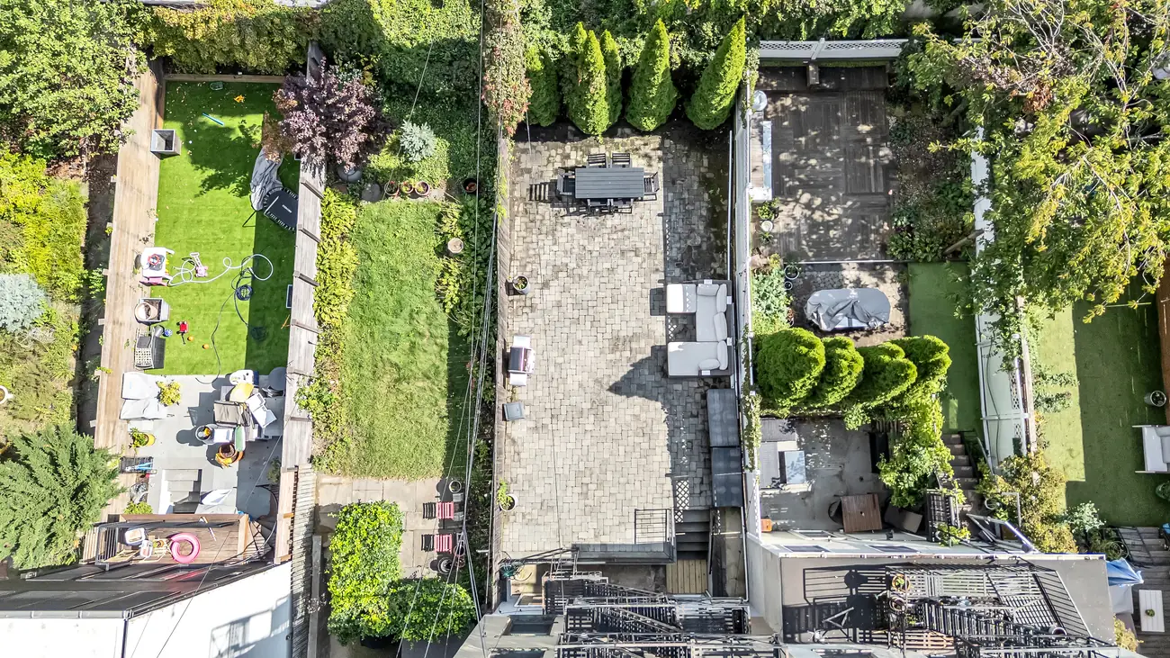 Overhead aerial view of the paver patio at 829 Garden Street and the neighboring yards.